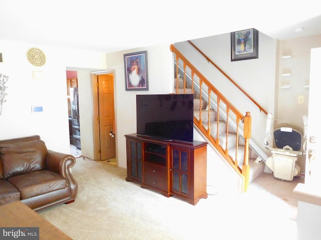7799 Outing Ave, Pasadena, MD 21122 - carpeted living room featuring stairway