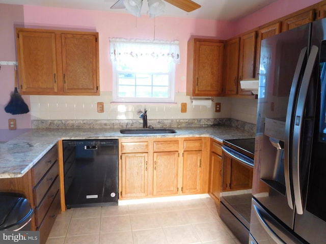 7799 Outing Ave, Pasadena, MD 21122 - kitchen featuring appliances with stainless steel finishes, a ceiling fan, light tile patterned floors, brown cabinets, and light countertops