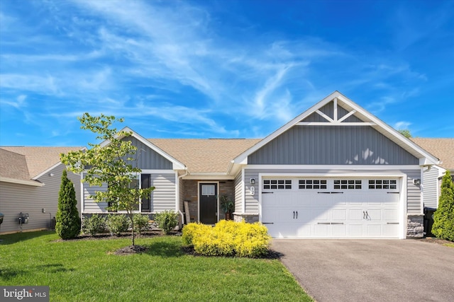 92 Senators Way, Berlin, NJ 08009 - view of front of home featuring stone siding, board and batten siding, asphalt driveway, and a garage