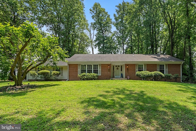 24411 Kakae Dr, Damascus, MD 20872 - single story home with a front yard and brick siding