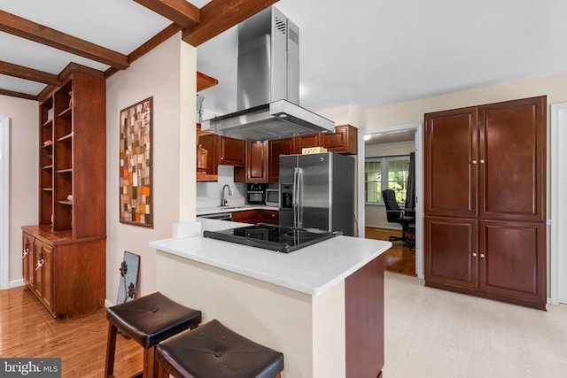 24411 Kakae Dr, Damascus, MD 20872 - kitchen with appliances with stainless steel finishes, island exhaust hood, light wood-type flooring, a peninsula, and beamed ceiling
