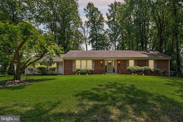24411 Kakae Dr, Damascus, MD 20872 - single story home with brick siding and a front lawn