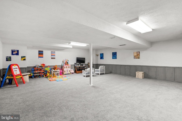 24411 Kakae Dr, Damascus, MD 20872 - game room with carpet flooring and a textured ceiling