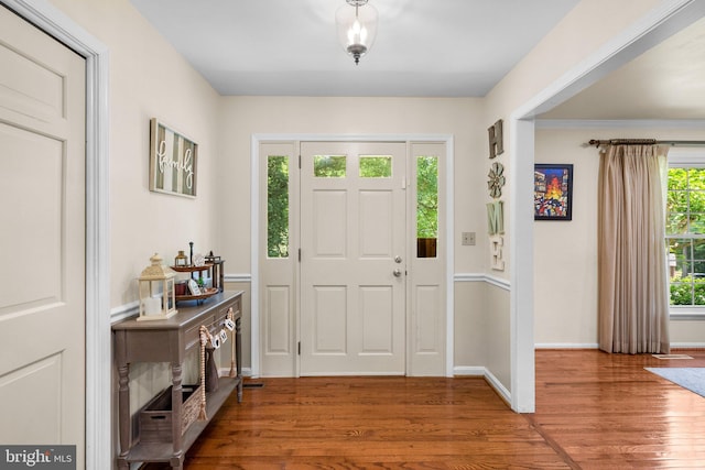 24411 Kakae Dr, Damascus, MD 20872 - foyer entrance featuring wood finished floors and baseboards