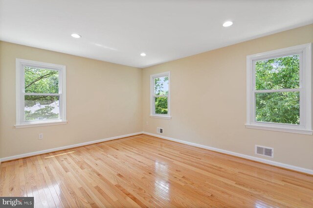 11013 Lopa Ln, North Potomac, MD 20878 - empty room featuring hardwood / wood-style floors and recessed lighting