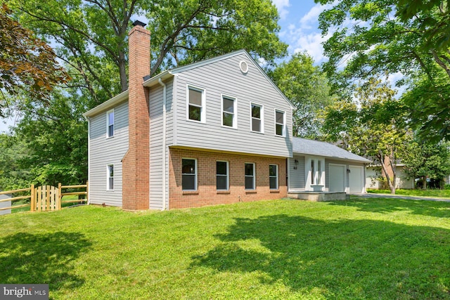 11013 Lopa Ln, North Potomac, MD 20878 - split level home with a chimney, an attached garage, brick siding, and driveway