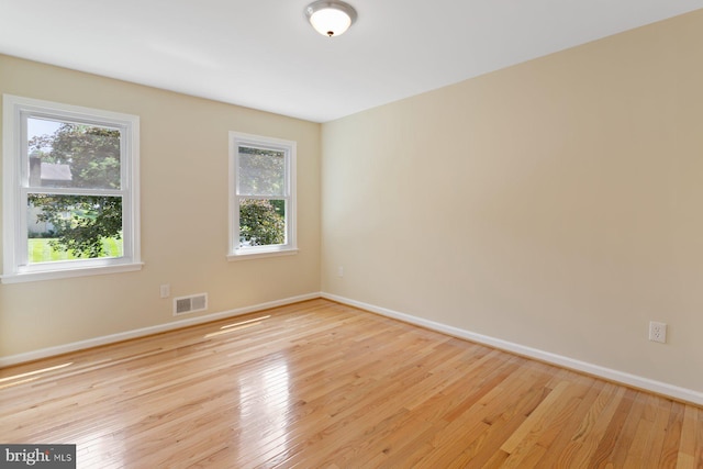 11013 Lopa Ln, North Potomac, MD 20878 - unfurnished room featuring healthy amount of natural light and light wood-style floors