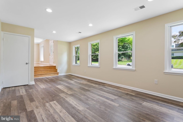 11013 Lopa Ln, North Potomac, MD 20878 - unfurnished room with wood finished floors, stairs, and recessed lighting