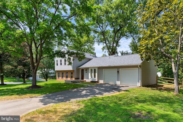 11013 Lopa Ln, North Potomac, MD 20878 - view of front facade with a garage, driveway, a front lawn, and roof with shingles