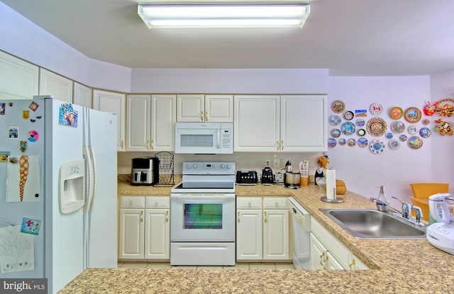 300 Bonnie Meadow Cir, Reisterstown, MD 21136 - kitchen with white appliances, light countertops, light tile patterned floors, and white cabinets