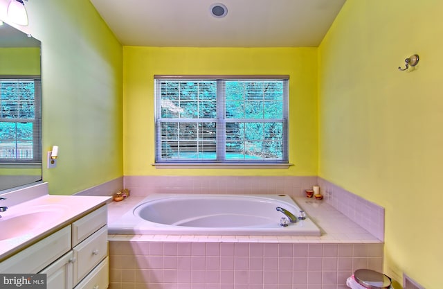 300 Bonnie Meadow Cir, Reisterstown, MD 21136 - bathroom with vanity and a bath