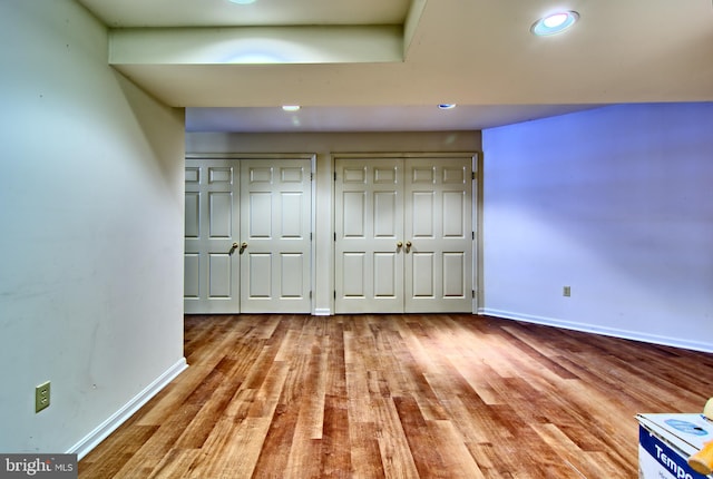 300 Bonnie Meadow Cir, Reisterstown, MD 21136 - unfurnished bedroom with multiple closets, wood finished floors, and recessed lighting