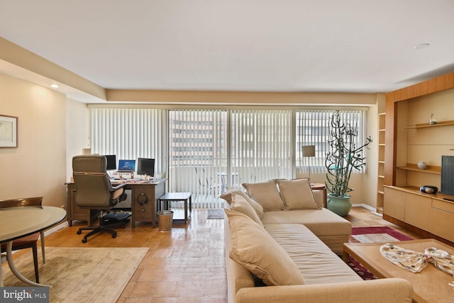 4515 Willard Ave Unit 1111S, Chevy Chase, MD 20815 - living room featuring an office area, built in shelves, and light wood finished floors