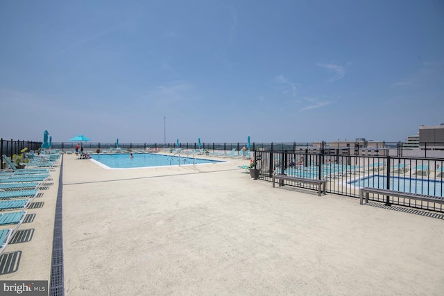 4515 Willard Ave Unit 1111S, Chevy Chase, MD 20815 - community pool featuring a patio area