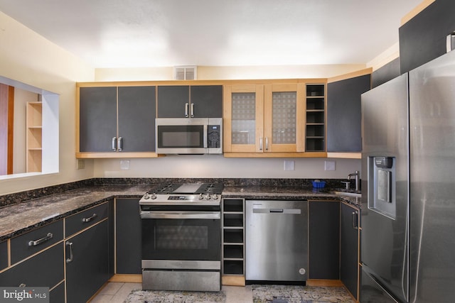 4515 Willard Ave Unit 1111S, Chevy Chase, MD 20815 - kitchen with stainless steel appliances, dark stone countertops, glass insert cabinets, and open shelves