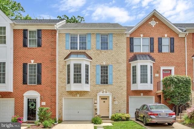 1403 Peregrine Path, Arnold, MD 21012 - view of property featuring driveway, a garage, and brick siding