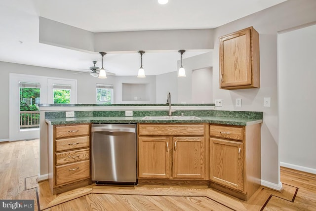 1403 Peregrine Path, Arnold, MD 21012 - kitchen featuring stainless steel dishwasher, dark countertops, ceiling fan, and light wood-type flooring