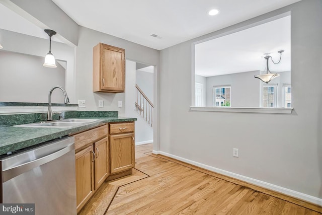 1403 Peregrine Path, Arnold, MD 21012 - kitchen with dishwasher, dark countertops, light wood-type flooring, hanging light fixtures, and recessed lighting