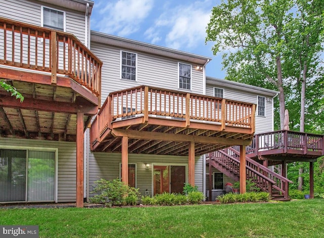 1403 Peregrine Path, Arnold, MD 21012 - rear view of house featuring a deck, a lawn, and stairs