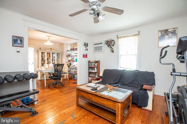 77 Atkins Ave, Hamilton, NJ 08610 - living area featuring a ceiling fan, an office area, light wood-style floors, crown molding, and an AC wall unit