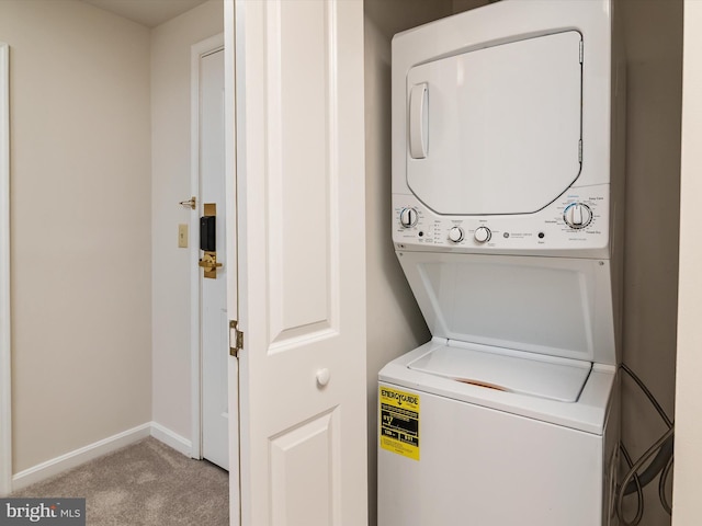 7101 Bay Front Dr Unit 204, Annapolis, MD 21403 - laundry area with stacked washer / drying machine and carpet floors