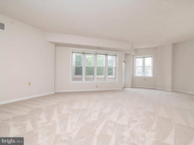 7101 Bay Front Dr Unit 204, Annapolis, MD 21403 - empty room featuring baseboards and light colored carpet