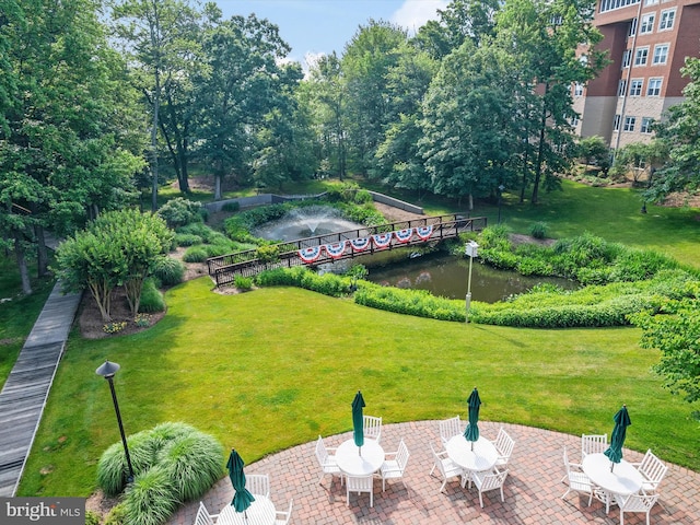 7101 Bay Front Dr Unit 204, Annapolis, MD 21403 - view of grassy yard with a patio area
