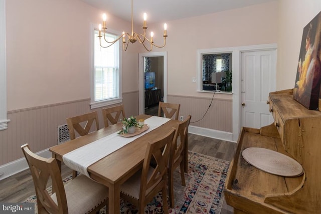 213 Conover St, Burlington, NJ 08016 - dining space with a wainscoted wall, wood finished floors, and a chandelier