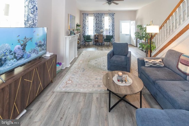 213 Conover St, Burlington, NJ 08016 - living area with light wood-style floors, a ceiling fan, and stairway