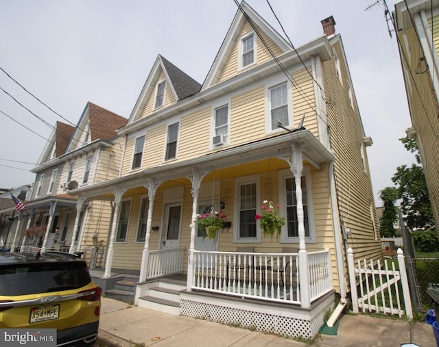213 Conover St, Burlington, NJ 08016 - view of front of home featuring covered porch and a chimney