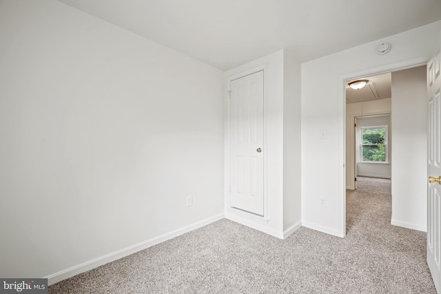 34 Ingate Ter Unit 4410, Halethorpe, MD 21227 - unfurnished bedroom featuring attic access and carpet flooring