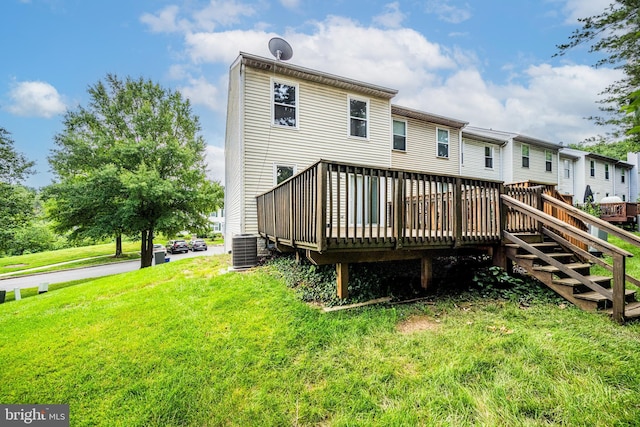 34 Ingate Ter Unit 4410, Halethorpe, MD 21227 - back of property with a wooden deck and a yard
