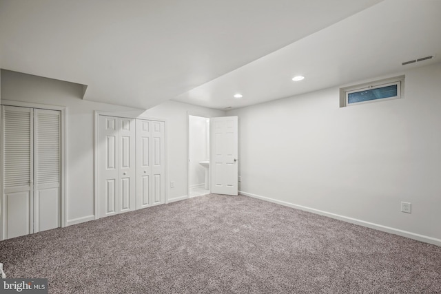 34 Ingate Ter Unit 4410, Halethorpe, MD 21227 - unfurnished bedroom featuring two closets, carpet flooring, and recessed lighting