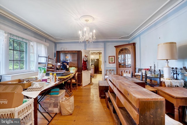 100 Springdale Rd, York, PA 17403 - dining room featuring crown molding, a chandelier, light wood-style floors, and healthy amount of natural light