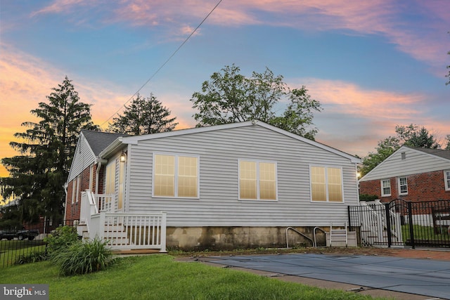 407 Pinecrest Rd, Norristown, PA 19403 - property exterior at dusk with a gate