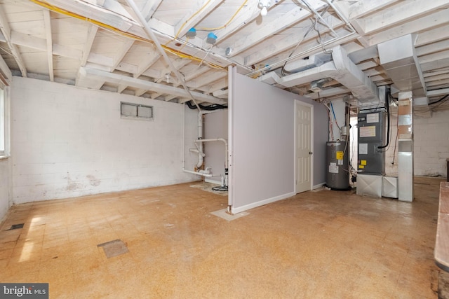 101 E Macphail Rd, Bel Air, MD 21014 - below grade area with electric water heater, heating unit, and concrete block wall