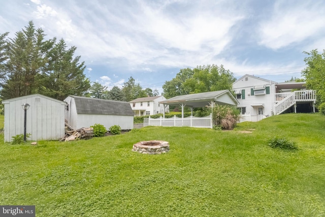 101 E Macphail Rd, Bel Air, MD 21014 - view of yard with an outdoor fire pit and a storage unit