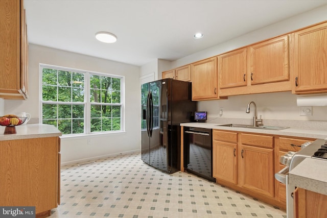 1009 Red Rock Cir, Royersford, PA 19468 - kitchen with black appliances, light countertops, and recessed lighting