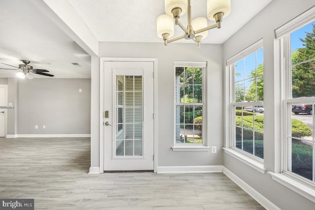 25909 Ridge Manor Dr Unit A, Damascus, MD 20872 - entryway featuring a chandelier, light wood-style floors, and a ceiling fan