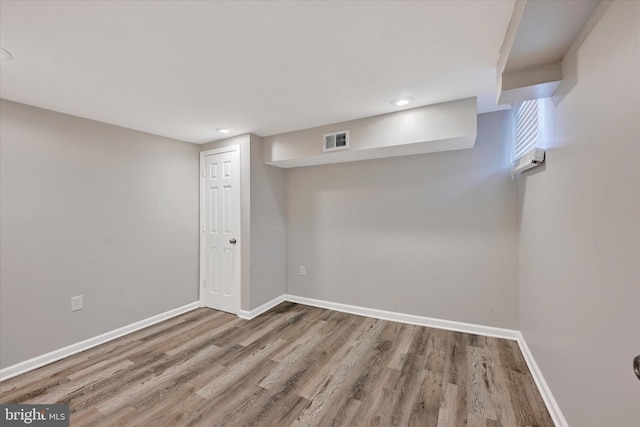 405 N Loudon Ave, Baltimore, MD 21229 - finished below grade area featuring wood finished floors and recessed lighting