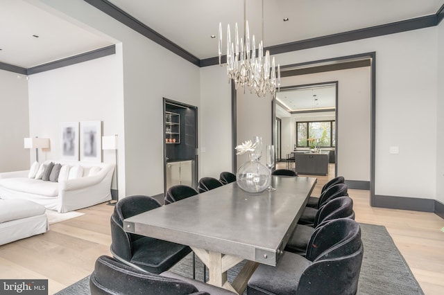 1020 Langley Hill Dr, Mclean, VA 22101 - dining room featuring a chandelier, light wood-style floors, and crown molding