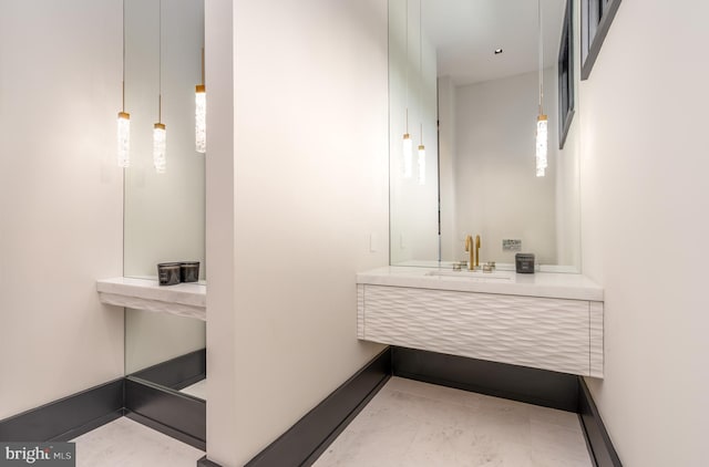 1020 Langley Hill Dr, Mclean, VA 22101 - bathroom with a sink and baseboards