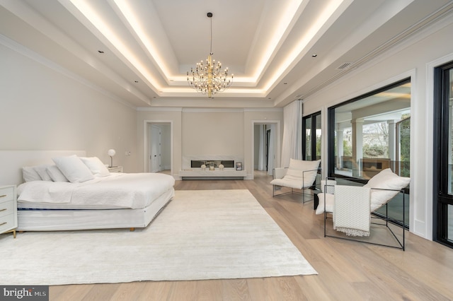 1020 Langley Hill Dr, Mclean, VA 22101 - bedroom featuring a chandelier, a raised ceiling, and wood finished floors