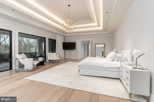 1020 Langley Hill Dr, Mclean, VA 22101 - bedroom featuring a chandelier, a tray ceiling, and light wood-style floors