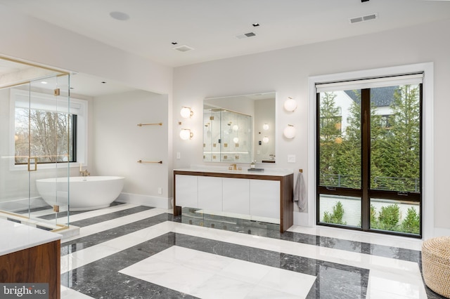 1020 Langley Hill Dr, Mclean, VA 22101 - full bath featuring vanity, a soaking tub, and inlaid floor details