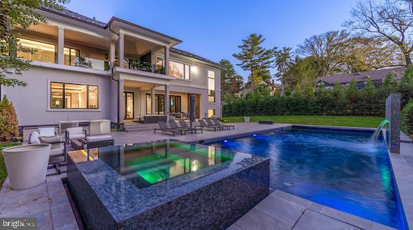 1020 Langley Hill Dr, Mclean, VA 22101 - view of pool with a patio and an in-ground hot tub