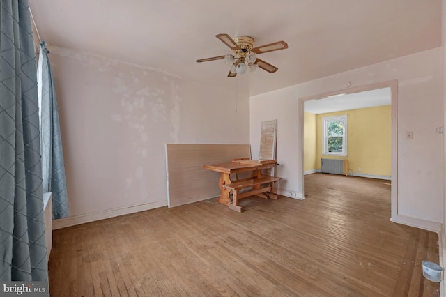 2704 N Tatnall St, Wilmington, DE 19802 - unfurnished room featuring radiator, a ceiling fan, and hardwood / wood-style flooring