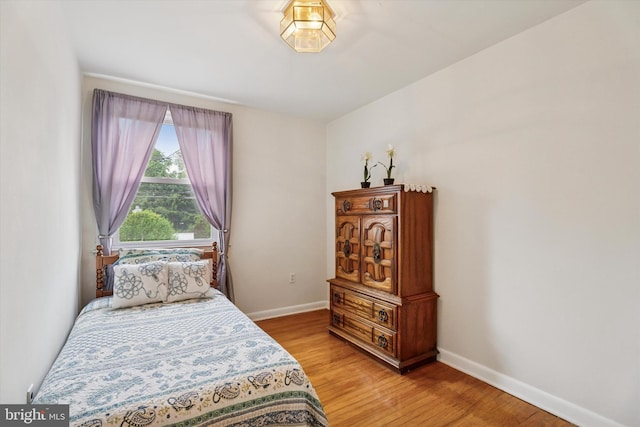 575 Wanamaker Rd, Jenkintown, PA 19046 - bedroom with baseboards and light wood-style flooring