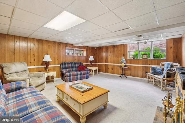575 Wanamaker Rd, Jenkintown, PA 19046 - living room featuring wooden walls, carpet flooring, and a drop ceiling