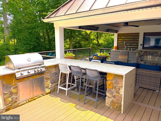 20 Heron Hill Dr, Downingtown, PA 19335 - wooden deck with area for grilling and view of wooded area